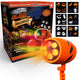 A Halloween-themed light projector with various spooky designs, including ghosts and pumpkins. The packaging highlights features multiple slides, a point-and-play button, and vibrant projections.